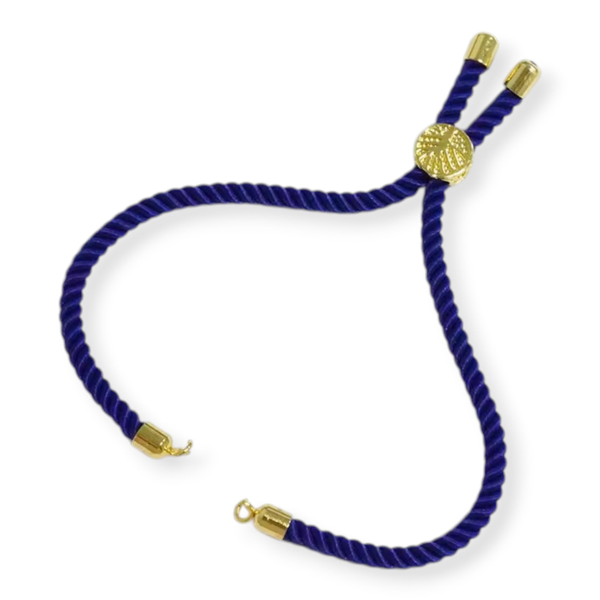 Multi-strand blue silk Rakhi bracelet featuring small white pearl spacers and a tassel finish.