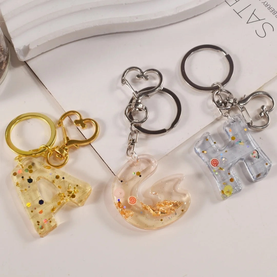 Small 3D bubble font alphabet mould for casting personalized resin jewelry, bag tags, and accessories.