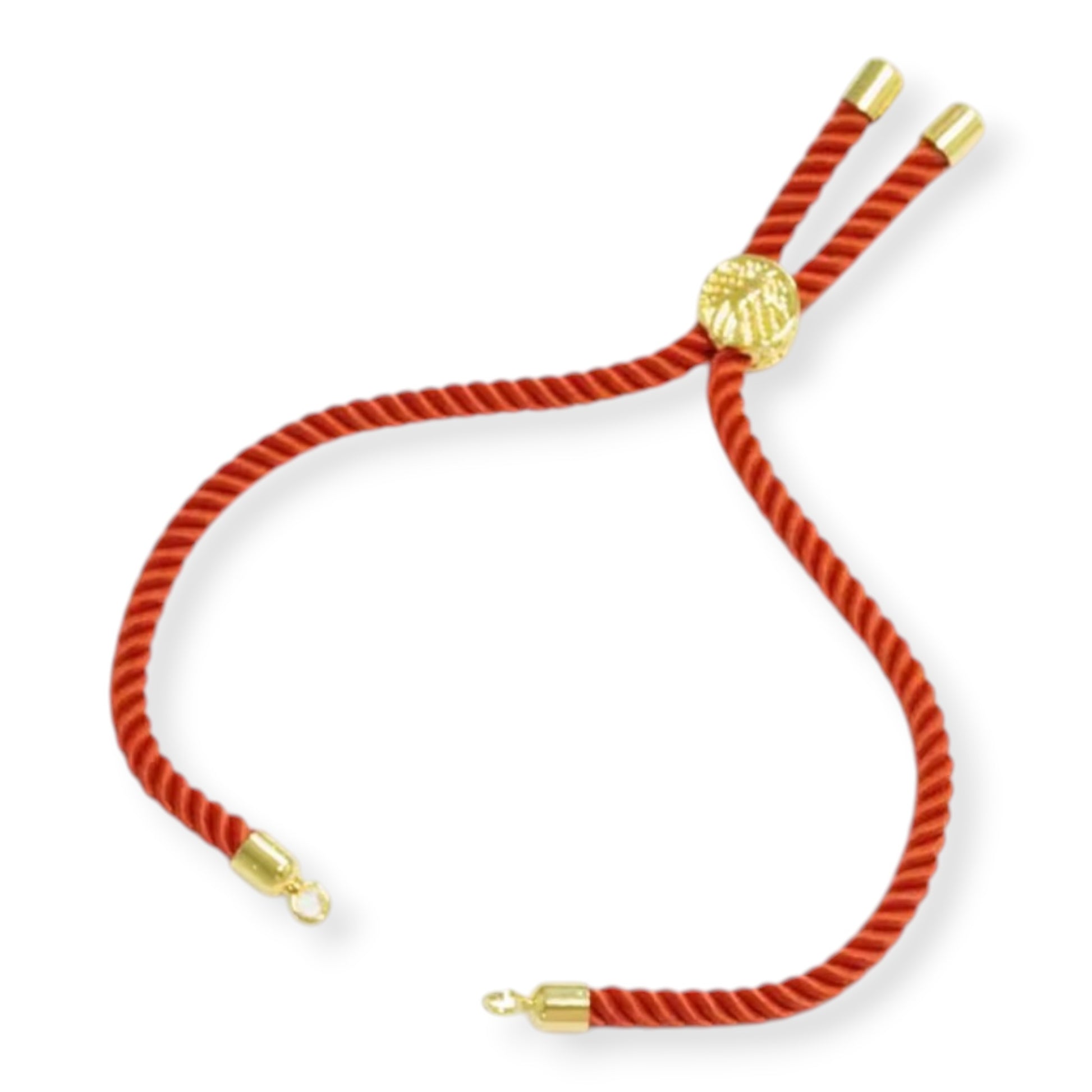 Designer Rakhi thread chain with a personalized initial charm, perfect for long-distance gifting.