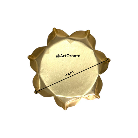 Handcrafted metal candle urli bowl with brass finish, ideal for Indian festive candle making and decor